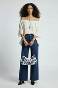 Bolso Von Dutch Cow Print Blue – botas tacón y palazzo
